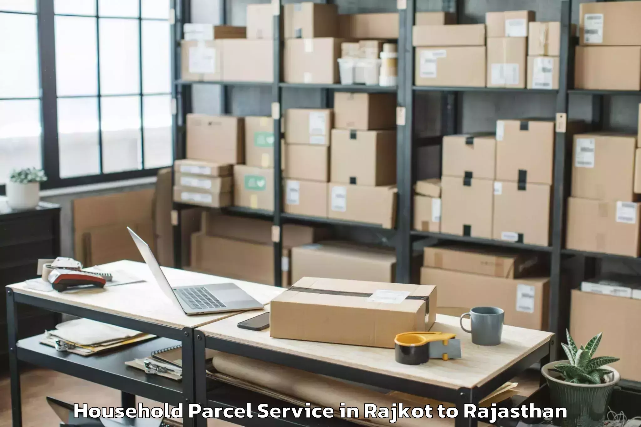 Top Rajkot to Pacific University India Udaip Household Parcel Available